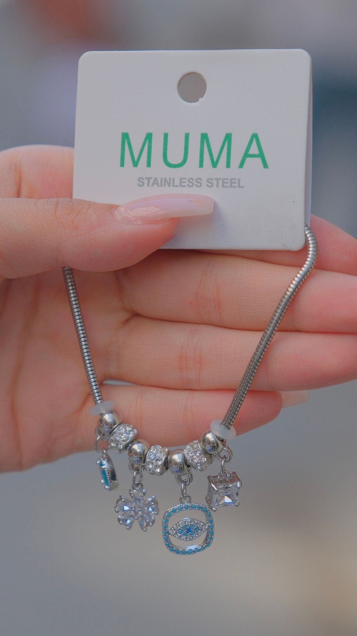 muma-aksesuar-charm-nazar-gumus-kaplama-bileklik-1 Charm Nazar Gümüş Renk Zincir Bileklik - Görsel 1